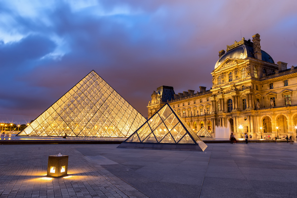 PARIS, FRANCE - JUNE 06, 2017 : Louvre museum with pyramid in twilight